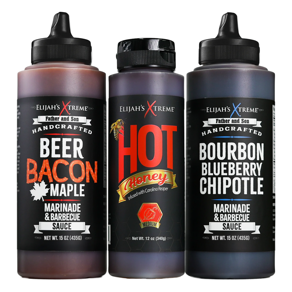 Three bottles of Elijahs Xtreme sauces on a white background